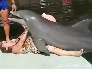 Mature feels aroused when the dolphin humps her a little bit