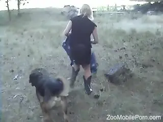 Mature blonde pulls down undies to have sex with her dog