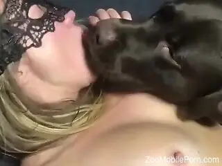 Nude woman lets the curious dog lick her everywhere