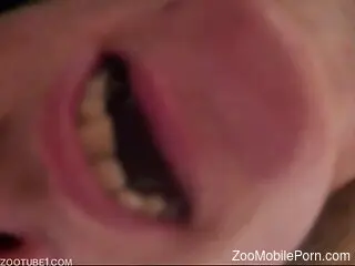 Thirsty woman shows off with crawling creatures in her mouth