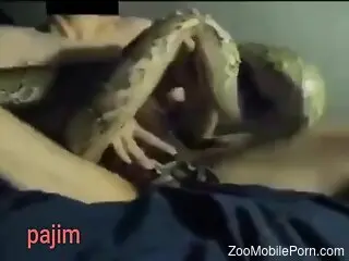 Slim man tries naked sex with his lizard in homemade scenes