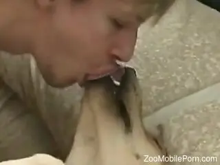 Amateur guy sucks his dog's dick and tries anal with it